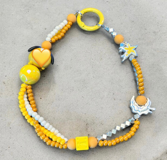 Yellow Happy Dog Bead Phone Charm P237